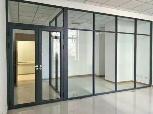 Premium aluminium glass partition for office and commercial interiors by Sree Sendhur Decors.